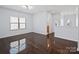 Spacious bonus room with hardwood floors and natural light from the window at 4329 Hunton Dale Nw Rd, Concord, NC 28027