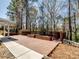 Expansive backyard deck with built in planters and wooded surroundings, perfect for outdoor entertaining at 4329 Hunton Dale Nw Rd, Concord, NC 28027