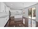 Modern kitchen with white cabinets, stainless steel appliances, and granite countertops at 4329 Hunton Dale Nw Rd, Concord, NC 28027