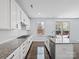 Gourmet kitchen featuring gas cooktop, stainless steel appliances, and a center island at 4329 Hunton Dale Nw Rd, Concord, NC 28027