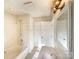 Bathroom with tub and shower combo, vanity, and white cabinets at 4910 Summerside Dr, Clover, SC 29710