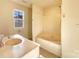Bathroom featuring a soaking tub, shower, and vanity at 4910 Summerside Dr, Clover, SC 29710