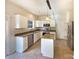 Well-lit kitchen with stainless steel appliances, granite countertops, and an island at 4910 Summerside Dr, Clover, SC 29710