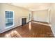 Bright living room featuring wood flooring and fireplace at 4910 Summerside Dr, Clover, SC 29710
