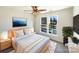 Cozy main bedroom with a ceiling fan, large windows, and neutral decor at 4910 Summerside Dr, Clover, SC 29710