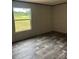 Cozy bedroom featuring a view of the outdoors from its window at 514 Eagle Mills Rd # 3, Hamptonville, NC 27020
