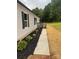 Inviting home exterior with manicured landscaping and a charming walkway at 514 Eagle Mills Rd # 3, Hamptonville, NC 27020