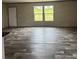 Open concept living area featuring luxury vinyl plank flooring and lots of natural light at 514 Eagle Mills Rd # 3, Hamptonville, NC 27020
