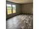 Bright living space with luxury vinyl plank flooring, providing an open concept layout at 514 Eagle Mills Rd # 3, Hamptonville, NC 27020