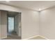 Neutral-colored bedroom featuring plush carpet and a hallway entrance at 5629 Axil Ln, Charlotte, NC 28269