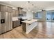 Well-equipped kitchen with large island and stainless-steel appliances perfect for cooking and entertaining at 5629 Axil Ln, Charlotte, NC 28269