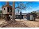 Home exterior with a wooden treehouse in the backyard at 5825 Ruth Dr, Charlotte, NC 28215