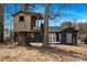 Home exterior with a fun treehouse in the backyard at 5825 Ruth Dr, Charlotte, NC 28215