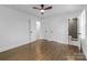 Bedroom featuring hardwood floors, white walls and trim and multiple closets at 5825 Ruth Dr, Charlotte, NC 28215