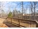 A wood deck surrounded by trees at 6044 Great Basin Ln, Fort Mill, SC 29707