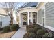 Charming front porch featuring stylish columns and a wreath-adorned door at 6044 Great Basin Ln, Fort Mill, SC 29707