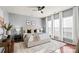 Spacious main bedroom features a ceiling fan, plush rug, and lots of natural light at 6044 Great Basin Ln, Fort Mill, SC 29707