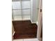 Walk-in closet featuring custom shelves and dark wood flooring at 6044 Great Basin Ln, Fort Mill, SC 29707