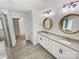 Elegant bathroom with dual sinks, granite countertops, and modern fixtures at 6234 Artigas Dr, Fort Mill, SC 29707