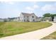 Spacious backyard featuring a well-maintained lawn at 730 Autumn Sage Dr, Indian Trail, NC 28079