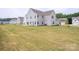 Large backyard with ample space and potential for landscaping at 730 Autumn Sage Dr, Indian Trail, NC 28079