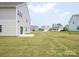 Expansive backyard with lush green lawn, perfect for outdoor activities at 730 Autumn Sage Dr, Indian Trail, NC 28079
