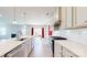 Modern kitchen with stainless steel appliances, an island, and an open-concept design at 730 Autumn Sage Dr, Indian Trail, NC 28079