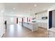 Open kitchen featuring a large center island, stainless appliances, and eat-in breakfast nook at 730 Autumn Sage Dr, Indian Trail, NC 28079