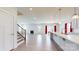 Bright, open-concept living space with hardwood floors, fireplace, and kitchen island at 730 Autumn Sage Dr, Indian Trail, NC 28079