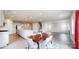 Open-concept living space with a dining area, kitchen, and fireplace at 730 Autumn Sage Dr, Indian Trail, NC 28079