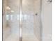 Modern shower featuring glass doors, marble tile, and chrome fixtures at 730 Autumn Sage Dr, Indian Trail, NC 28079
