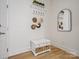 Charming entryway showcasing a decorative bench, mirror, and wall decor at 82116 Standing Oak Dr, Charlotte, NC 28278