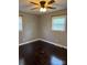Cozy bedroom with hardwood floors and bright natural light, creating a tranquil retreat at 948 Shannon Bradley Rd, Gastonia, NC 28052