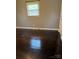 Comfortable bedroom with hardwood floors and natural light, ideal for restful nights and relaxation at 948 Shannon Bradley Rd, Gastonia, NC 28052