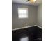 Cozy bedroom with hardwood floors and ample natural light, providing a serene and relaxing atmosphere at 948 Shannon Bradley Rd, Gastonia, NC 28052