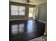 Inviting living room featuring hardwood floors, bright window, and a ceiling fan at 948 Shannon Bradley Rd, Gastonia, NC 28052