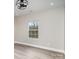 Bedroom with wood-look flooring and a window at 1010 Wilmouth St, Shelby, NC 28152