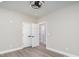 This bedroom features neutral walls, wood-look floors, and a modern ceiling fan at 1010 Wilmouth St, Shelby, NC 28152
