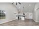 Bright open-concept kitchen featuring granite countertops and stainless steel appliances at 1010 Wilmouth St, Shelby, NC 28152