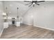 Spacious living area with vaulted ceilings and modern lighting fixtures at 1010 Wilmouth St, Shelby, NC 28152