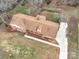 Aerial view of brick home showcasing the roof and surrounding landscape at 107 S Myrtle Ave, China Grove, NC 28023