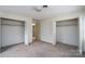Spacious bedroom with closet and open doorway to the rest of the house at 107 S Myrtle Ave, China Grove, NC 28023