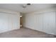 Bedroom with closet and open doorway to the rest of the house at 107 S Myrtle Ave, China Grove, NC 28023