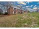 Spacious home with a brick exterior, and a sprawling front lawn at 107 S Myrtle Ave, China Grove, NC 28023