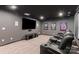 A sleek home theater is equipped with a large screen and comfortable seating at 1082 Dorsey Dr, Fort Mill, SC 29715
