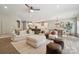 Spacious living room with modern decor, open floor plan, and abundant natural light at 1082 Dorsey Dr, Fort Mill, SC 29715