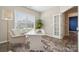 Cozy home office with ample natural light and space for a comfortable work environment at 1082 Dorsey Dr, Fort Mill, SC 29715