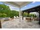 Spacious outdoor patio with a fire pit, seating, and a pergola, perfect for entertaining and enjoying the fresh air at 1082 Dorsey Dr, Fort Mill, SC 29715