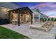 A tranquil outdoor living space featuring an elegant pergola and designer patio furniture at 1082 Dorsey Dr, Fort Mill, SC 29715