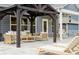 Stylish outdoor pergola with comfortable seating, perfect for relaxing and enjoying the backyard at 1082 Dorsey Dr, Fort Mill, SC 29715